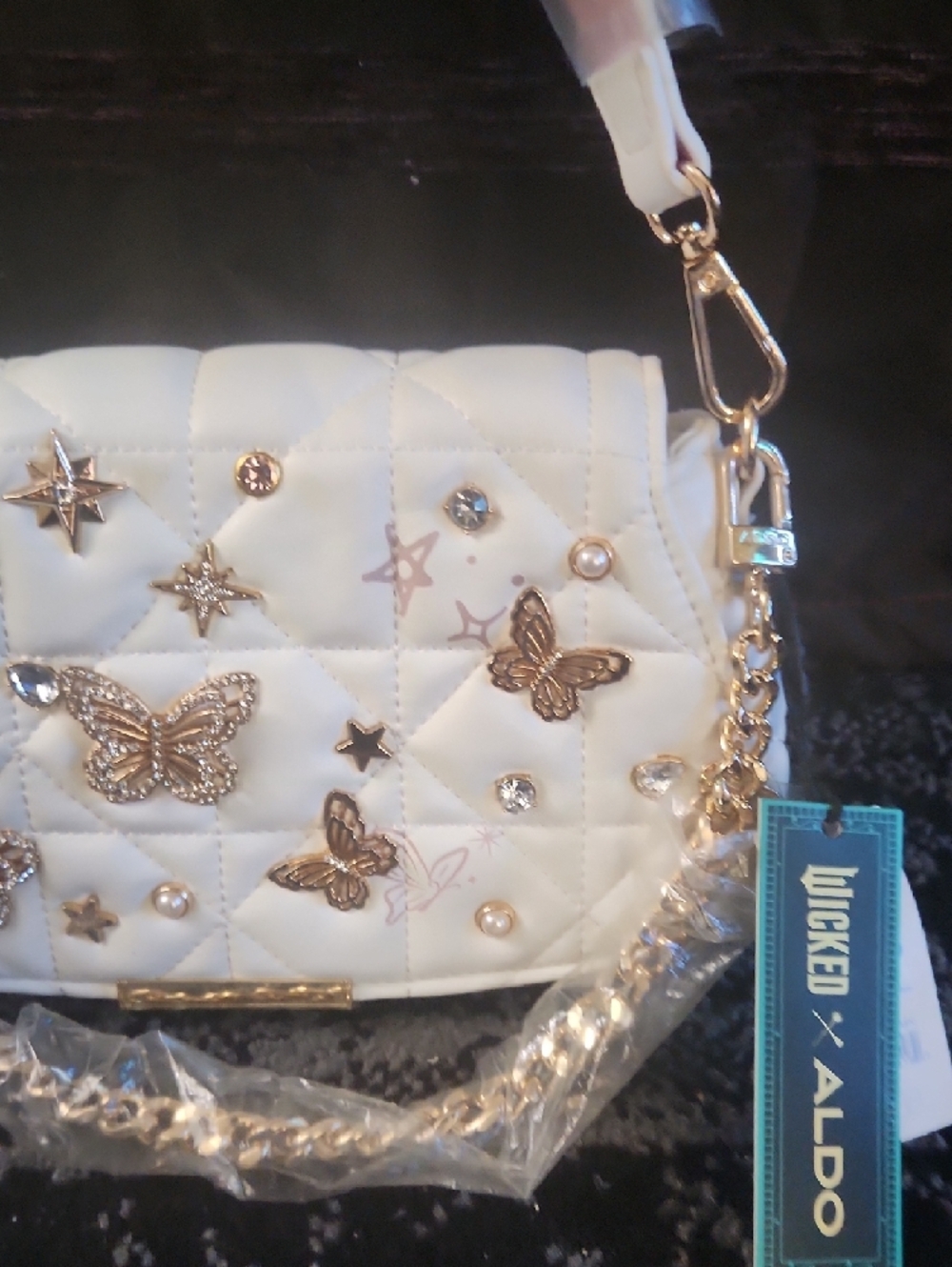 Small Aldo White Quilted Shoulder Bag with Gold Butterfly Accents - Picture 3 of 5